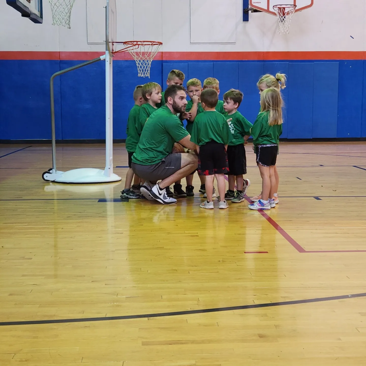 Coach Hopper coaching young athletes