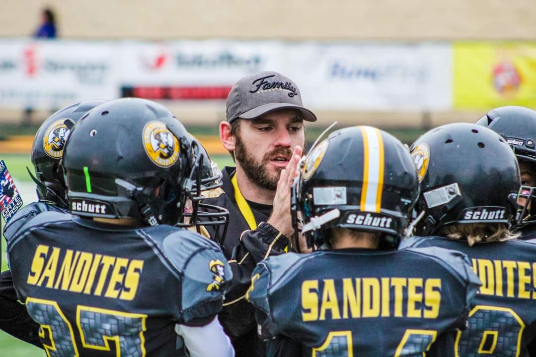 Coach Hopper coaching young athletes